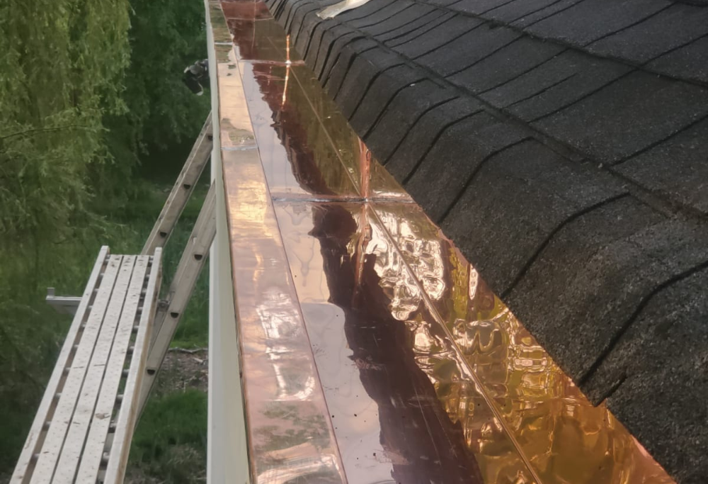Copper gutter work by Lasting Construction LLC
